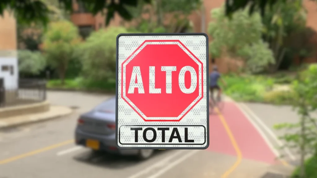 Señal de tránsito restrictiva de alto total, usada para indicar la obligación de detenerse por completo antes de continuar.